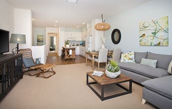 a living room with a couch and a table